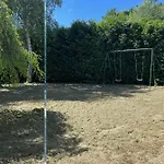 Dom wakacyjny 4 Mn De La Et Cabourg, Piscine, Cheminee, Table De Ping Pong, Balancoire